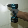 Makita HP332DSME 10,8V CXT Li-ion BL 35Nm ütvefúró-csavarbehajtó 2x4,0Ah