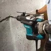 Makita HR3210C 850W 5,0J SDS-Plus fúró-vésőkalapács AVT
